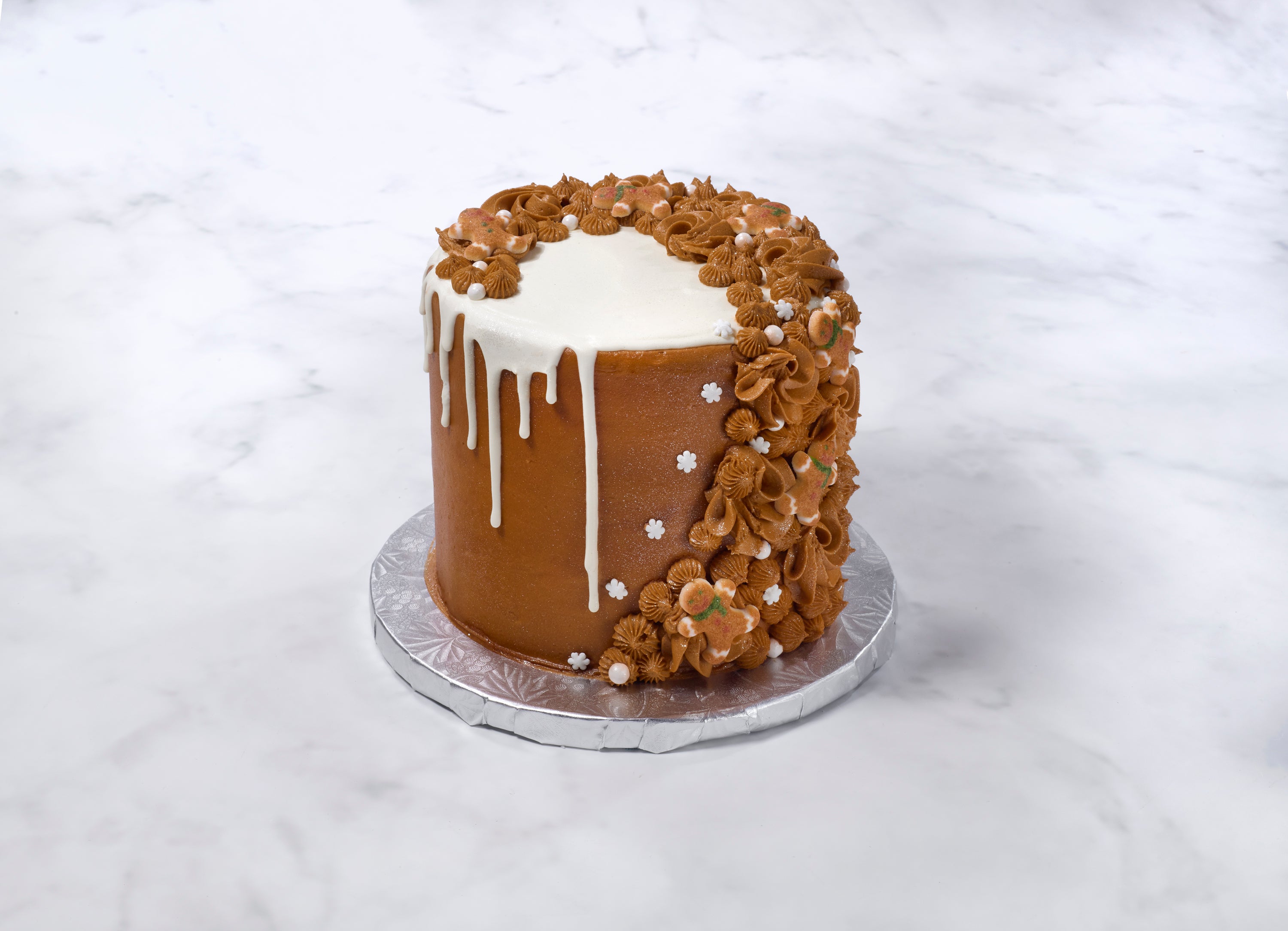 http://www.mishascupcakes.com/cdn/shop/products/adorablegingerbreadcake.jpg?v=1669840153